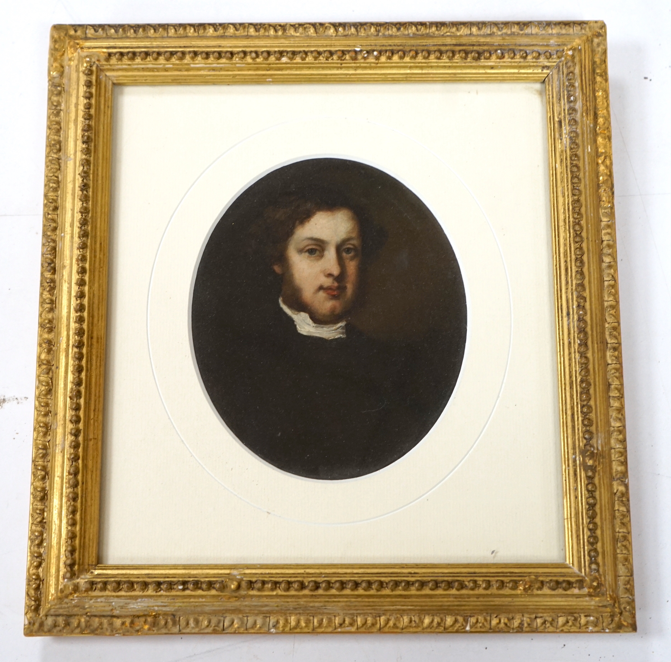 Mid Victorian School, oval oil, Portrait of a clerical gentleman, 14.5 x 12cm